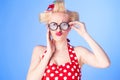 Surprised pin up girl with a vintage dress Royalty Free Stock Photo