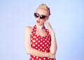 Surprised pin up girl with a vintage dress Royalty Free Stock Photo