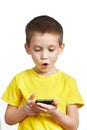 Surprised boy looking at phone Royalty Free Stock Photo