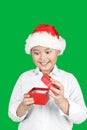Surprised boy opening Christmas gift Royalty Free Stock Photo