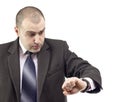 Surprised business man consulting his watch Royalty Free Stock Photo