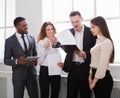 Surprised business team looking at documents in office Royalty Free Stock Photo