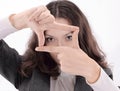 Surprised business woman making a photo frame from her hands. Royalty Free Stock Photo