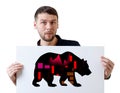 Surprised businessman with black silhouette bear financial icon.