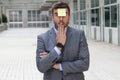 Surprised businessman with a note on his forehead Royalty Free Stock Photo