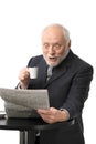 Surprised businessman reading newspaper Royalty Free Stock Photo
