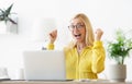 Surprised Businesswoman Celebrate Succcess With Arms Up