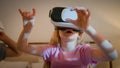 Surprised Caucasian children kids boy girl brother sister friends siblings playing online video game in virtual reality Royalty Free Stock Photo