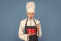 Surprised chef cook with saucepan. woman in apron and hat use beater. come to my cooking class. culinary school courses