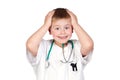 Surprised child with doctor uniform