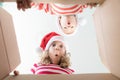 Surprised children unpack Christmas gift box Royalty Free Stock Photo