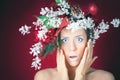 Surprised Christmas winter woman with tree hairstyle and makeup Royalty Free Stock Photo