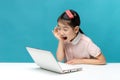 Surprised, Cute asia little girl who enjoy the laptop computer o Royalty Free Stock Photo