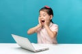 Surprised, Cute asia little girl who enjoy the laptop computer o Royalty Free Stock Photo