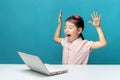 Surprised, Cute asia little girl who enjoy the laptop computer o Royalty Free Stock Photo