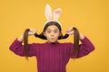 surprised easter teen girl in funny bunny ears having fun, happy easter