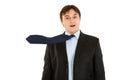 Surprised elegant businessman with blowing necktie