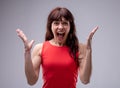 Surprised enthusiastic woman cheering Royalty Free Stock Photo