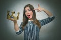 Excited woman with golden crown. First place concept. Royalty Free Stock Photo