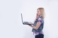 Surprised and excited young women looking on laptop screen. Royalty Free Stock Photo