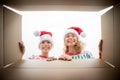 Surprised family unpack Christmas gift box Royalty Free Stock Photo