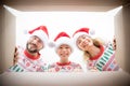 Surprised family unpack Christmas gift box Royalty Free Stock Photo