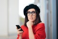 Surprised Fashion Woman Reading a Text Message Royalty Free Stock Photo