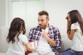 Surprised father looking at daughter with gift Royalty Free Stock Photo