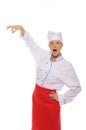 Surprised female chef picks up Royalty Free Stock Photo