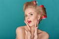 Funny blond woman over blue background Royalty Free Stock Photo