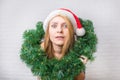 Surprised and funny christmas girl with christmas decoration. Wi Royalty Free Stock Photo