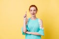 Surprised ginger woman in dress having idea Royalty Free Stock Photo