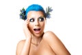 Surprised girl with flowers in her hair and make-up color Royalty Free Stock Photo