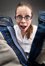 Surprised girl looking inside unzipped pants Royalty Free Stock Photo