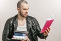 Surprised guy is reading a personal diary of his girlfriend Royalty Free Stock Photo