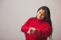 Surprised Hispanic Woman Looks At Wrist Watch