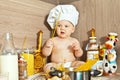 The surprised kid the chef cook cooks food Royalty Free Stock Photo