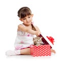 Surprised kid girl opening gift box with kitten Royalty Free Stock Photo