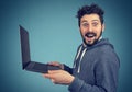 Surprised man with laptop computer Royalty Free Stock Photo