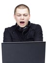 Surprised Man looking in computer. Technical trouble Royalty Free Stock Photo