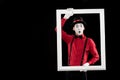 surprised mime holding frame isolated