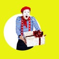 Surprised mime with present.Funny actor in red