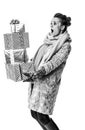 Surprised modern woman on white with pile of Christmas giftes Royalty Free Stock Photo