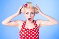 Surprised pin up girl with a vintage dress Royalty Free Stock Photo