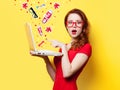 Surprised redhead girl with laptop Royalty Free Stock Photo
