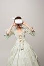 surprised retro style woman adjusting vr