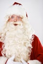 Surprised Santa. Close-up of Santa holding his belly and looking surprised - .