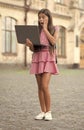 surprised school girl stydy online with computer. school girl stydy online outdoor