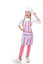 surprised schoolchild in costume of chef showing idea gesture