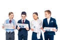 Surprised schoolchildren pretending to be businesspeople reading newspapers Isolated On White.